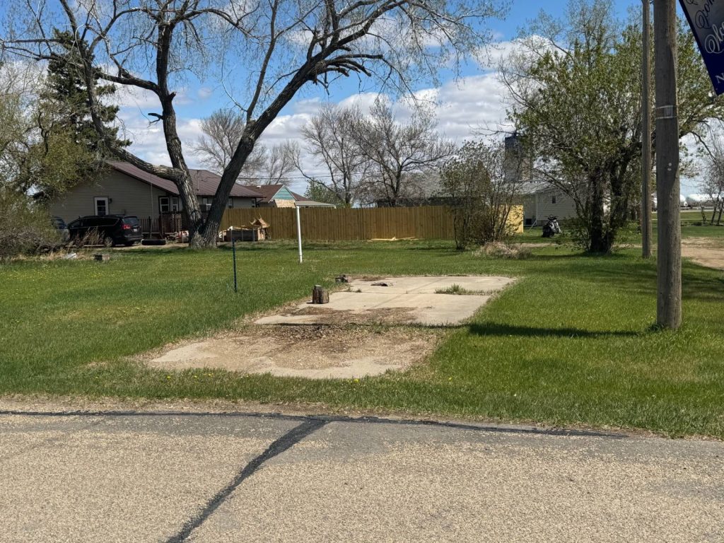 S 1/2 of LOTS 1 – 3 & S 1/2 of W 2' of LOT 4 BLK 8 Newburg, North Dakota